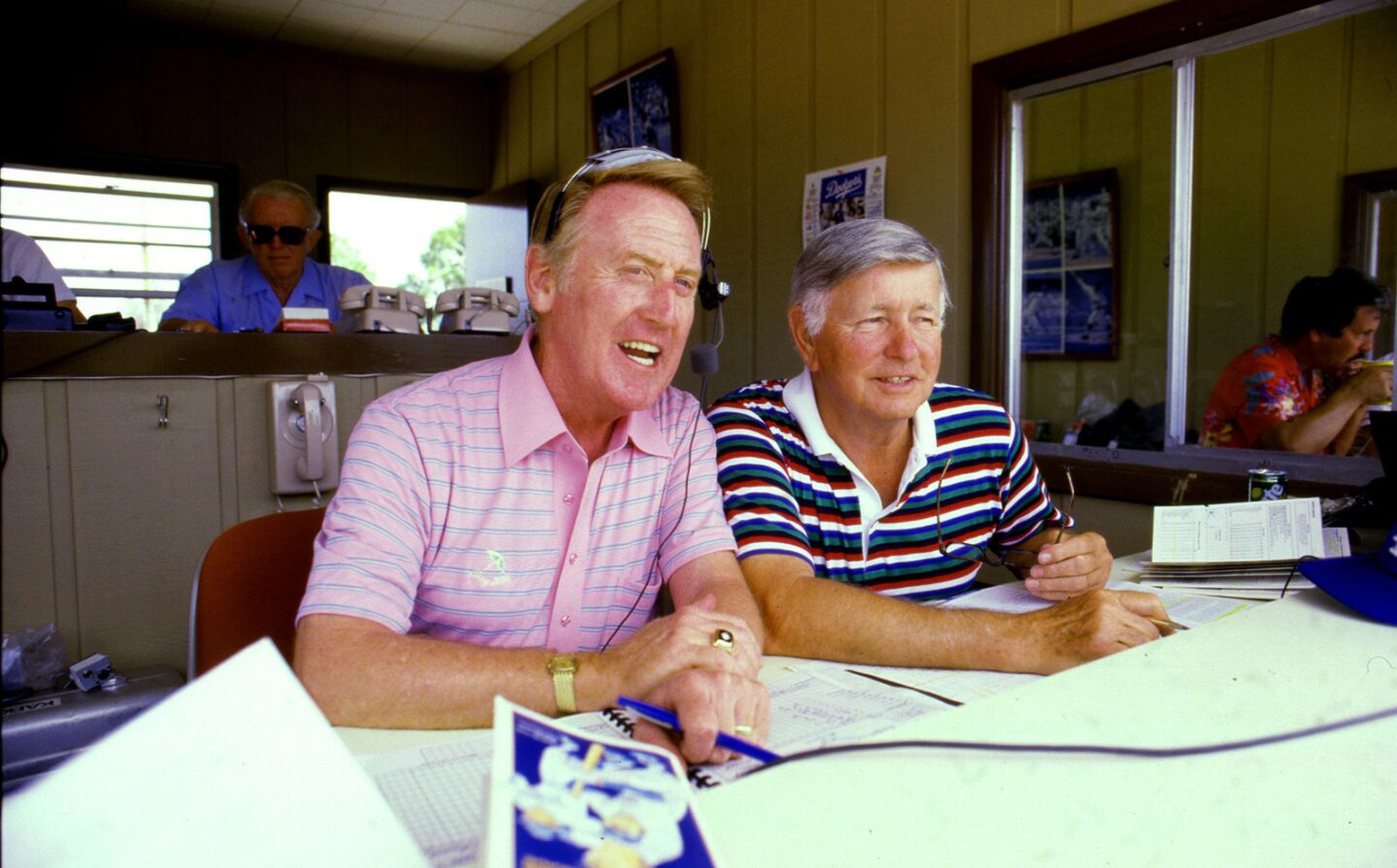Vin Scully with Jerry Doggett in the announcer's booth at Dodgertown during spring training in Vero Beach, Florida on April 8, 1985.