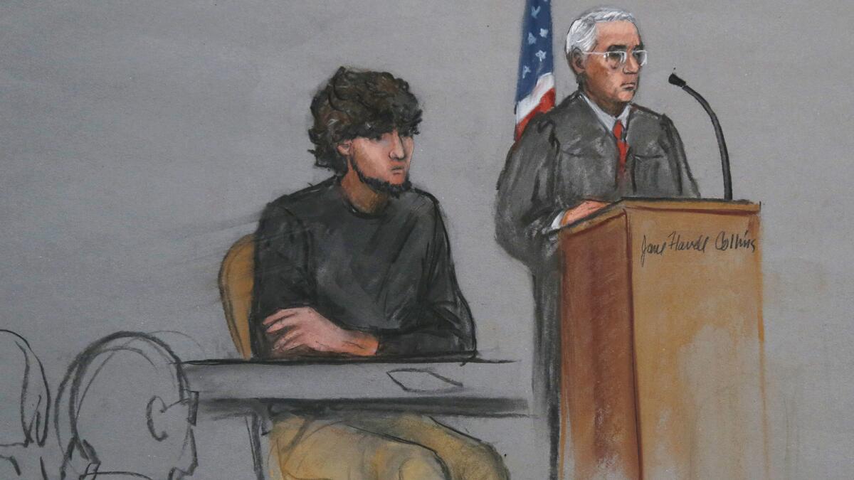 A courtroom sketch from January shows Boston Marathon bombing suspect Dzhokhar Tsarnaev, left, beside U.S. District Judge George A. O'Toole Jr.