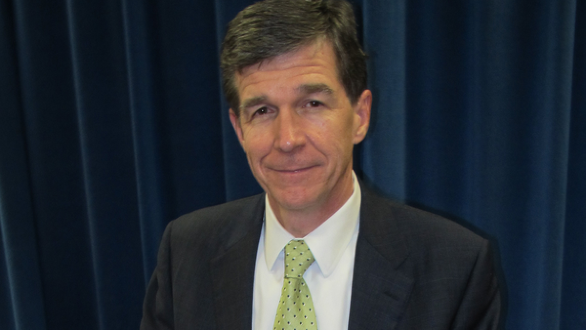 North Carolina Atty. Gen. Roy Cooper is a Democrat in a sea of conservative GOP state officials. He's publicly objected to the state's strict voter ID law, angering Republicans.