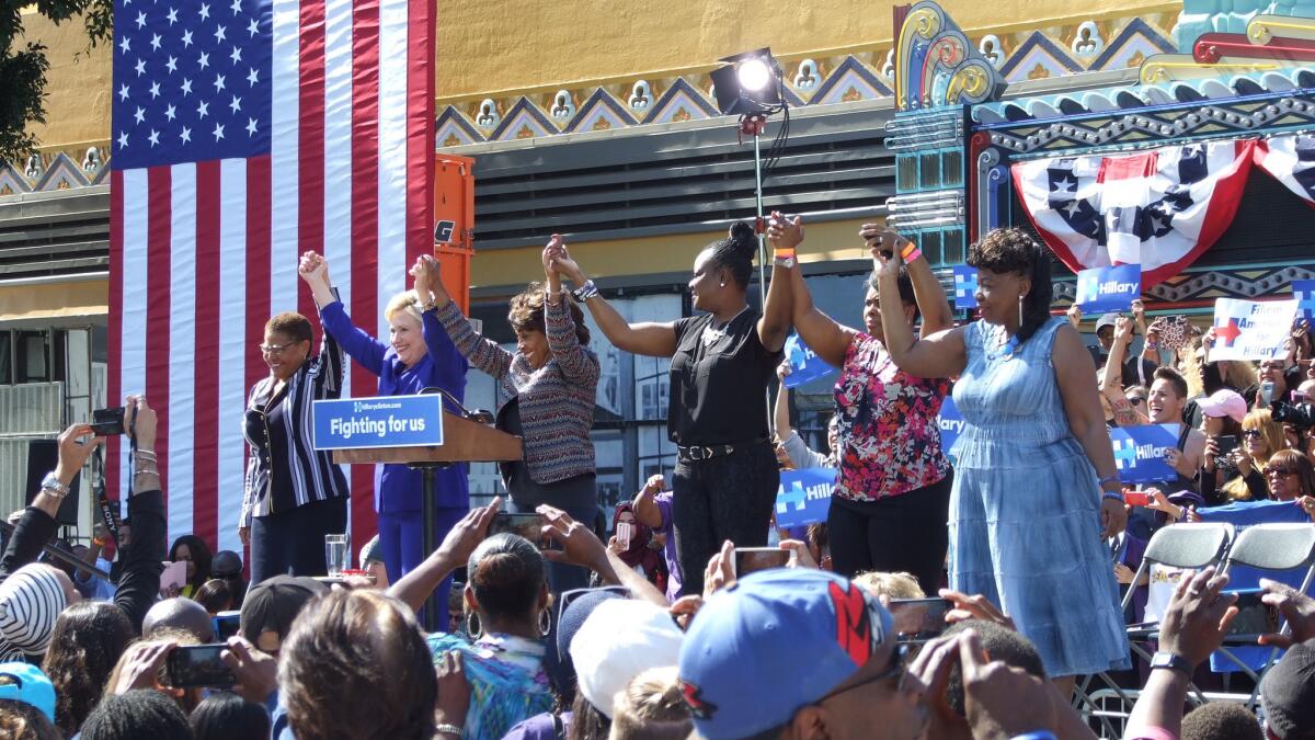 Hillary Clinton campaigns in Leimert Park with two female members of Congress and three mothers of slain black men.