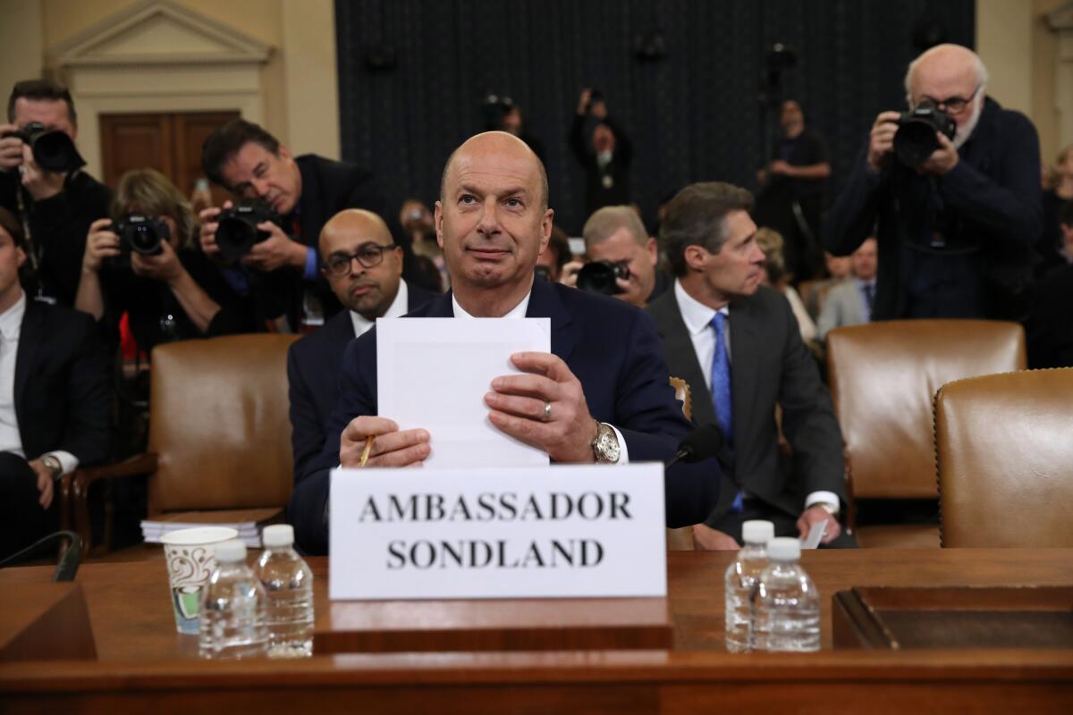 Gordon Sondland, the U.S. ambassador to the European Union, testifies in impeachment hearings Nov. 20, 2019.