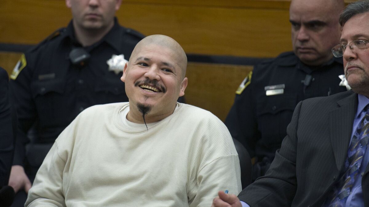Luis Bracamontes smiles as he is sentenced to death in the murders of two law enforcement officers. Footage of the court appearance was used in a video posted by President Trump to encourage constituents to "vote Republican."