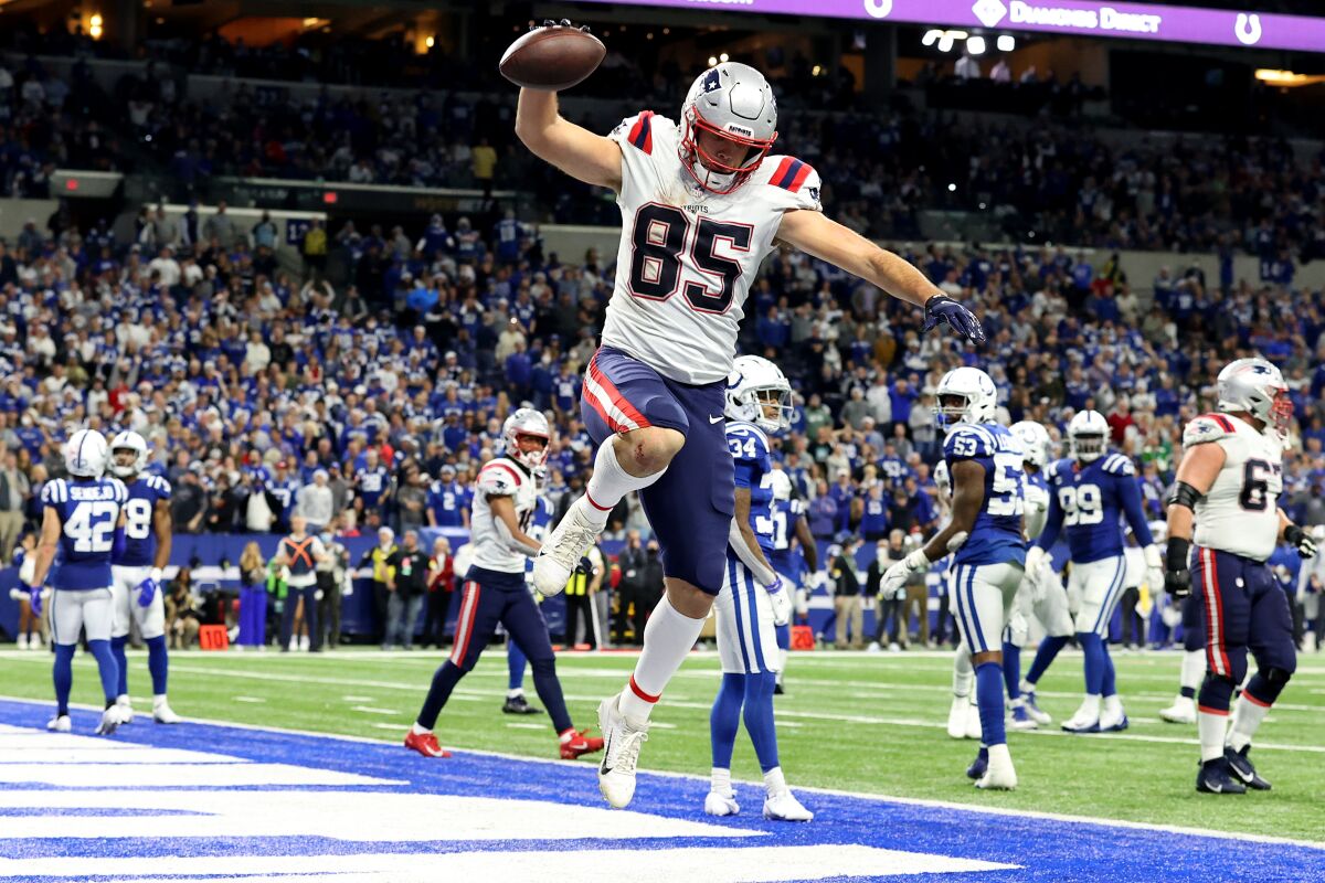 Hunter Henry of the New England Patriots celebrates after scoring a touchdown against the Colts.