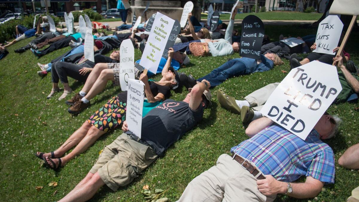 A healthcare "Die-in" at the Monroe County Courthouse in Bloomington, Ind. on June 26.
