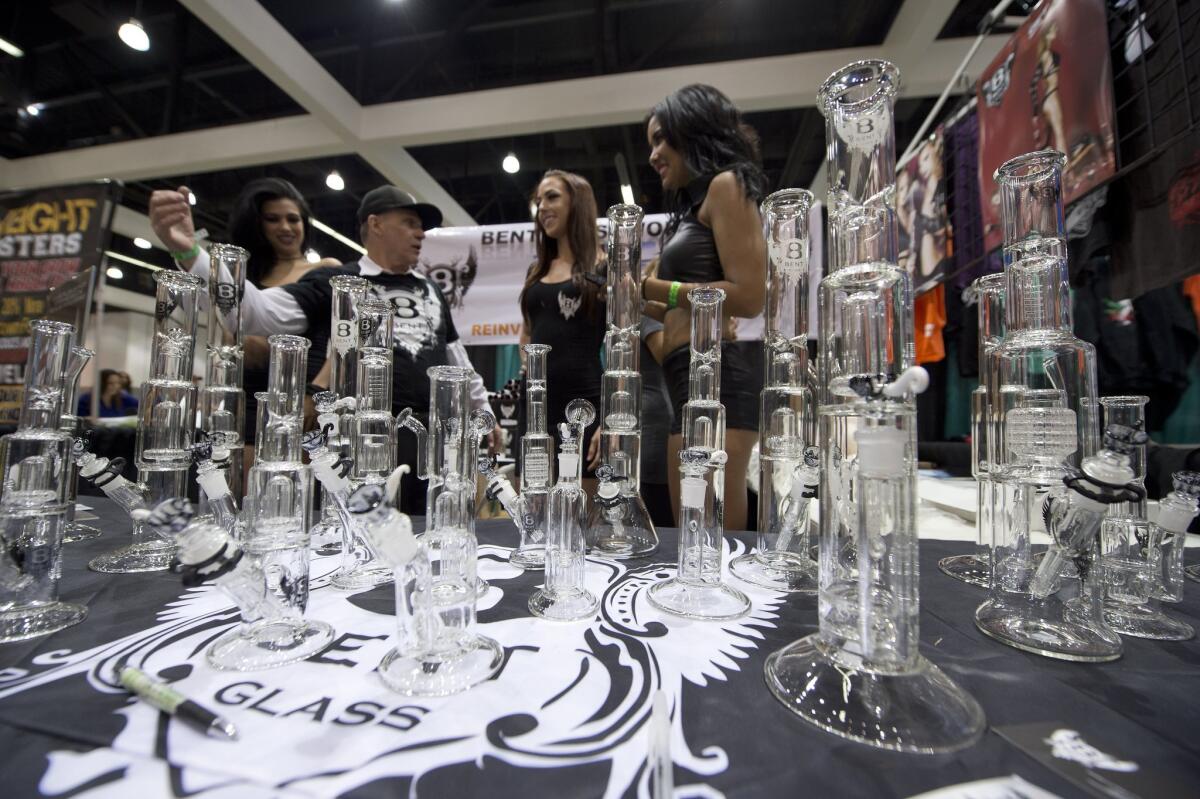 Glass water pipes, or bongs, are displayed at the HempCon, a medical marijuana expo held at the Los Angeles Convention Center.
