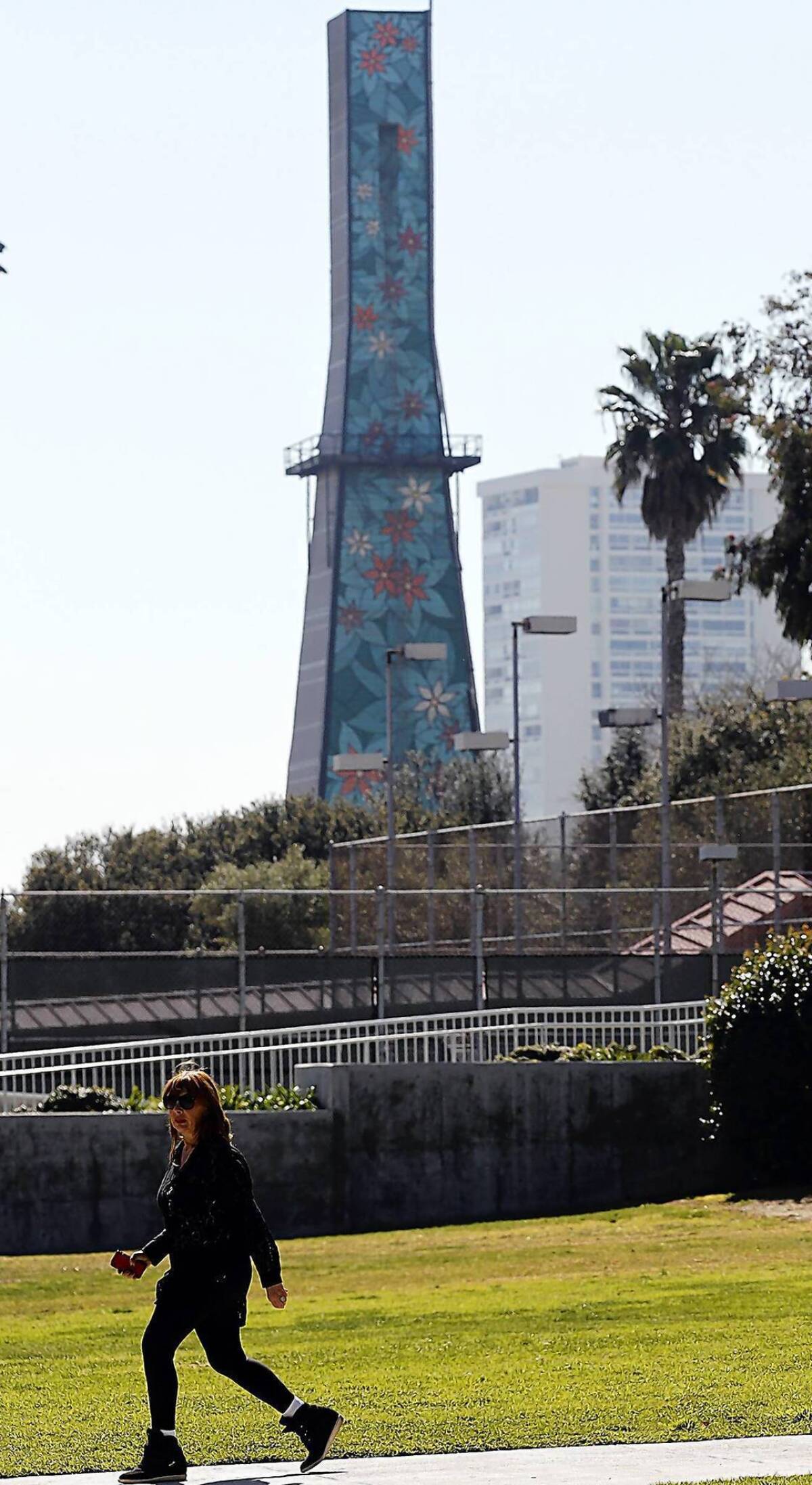 A decorative exterior masks an oil rig on Olympic Boulevard in Beverly Hills next to Beverly Hills High.