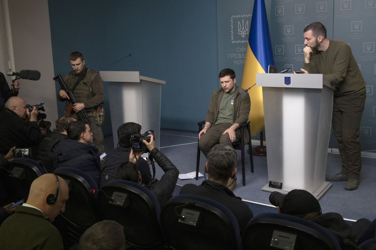 Ukrainian President Volodymyr Zelensky speaks at a news conference.