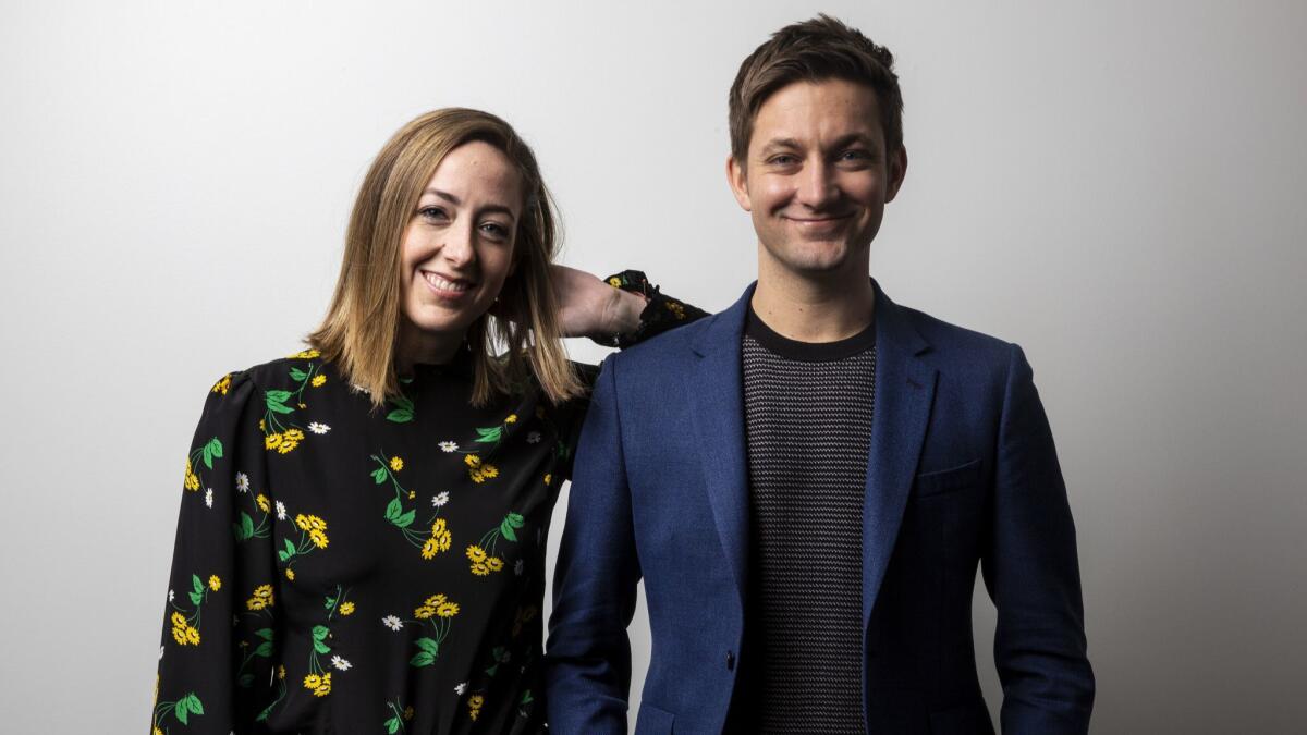 Chris Kelly and Sarah Schneider pose for a portrait at the Comedy Central offices in Hollywood.