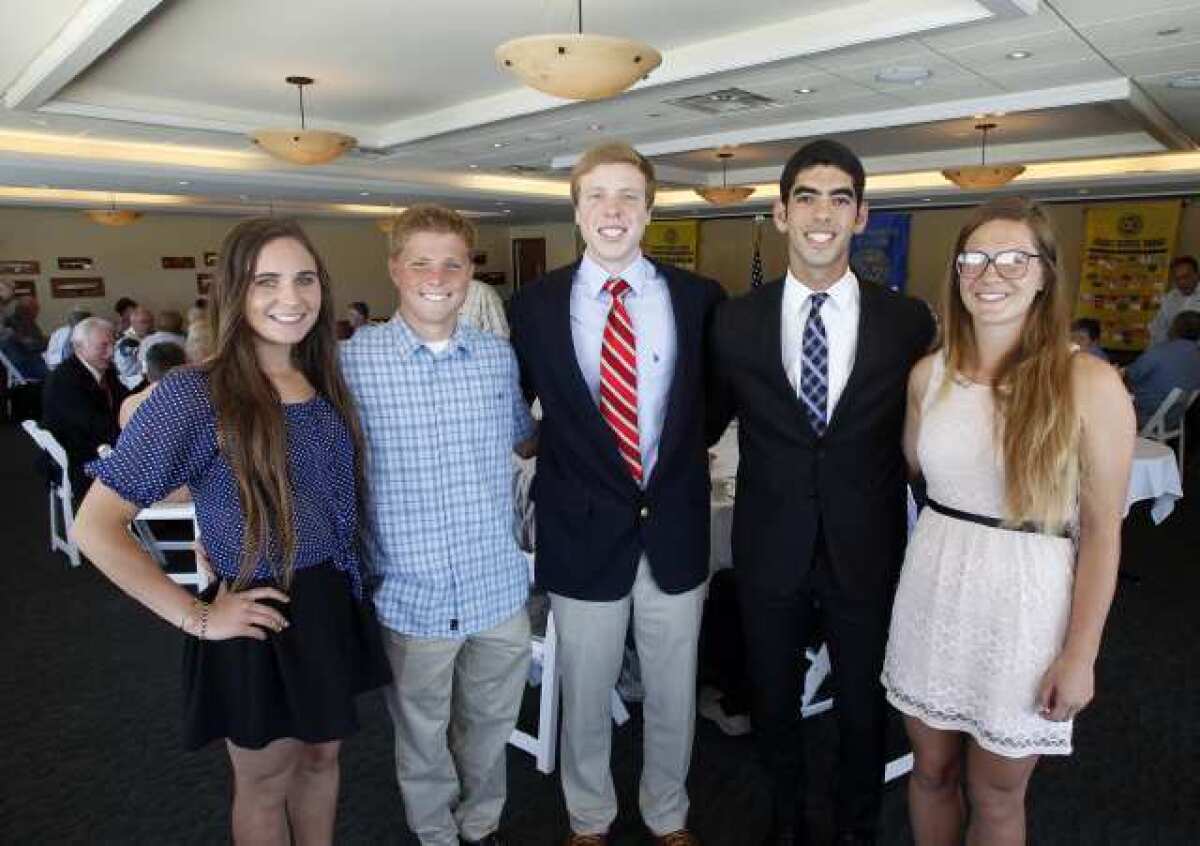 Five of the Newport Harbor Exchange Club Youth of the Year Scholarship winners, from left: Ilene Umansky of Estancia, Matt Thomas of Estancia; Michael Cantwell of Newport Harbor; Ryon Sabouni of Corona del Mar and Katie Groke of Corona del Mar, during an awards luncheon at the Bahia Corinthian Yacht Club on Thursday.