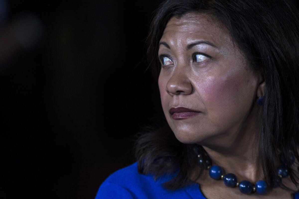 Rep. Norma Torres (D-Pomona) listens during a news conference.