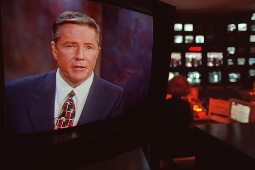  Michael Tuck is shown on one of the many video monitors in a control room at Channel 8 