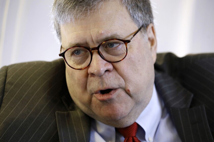 Attorney General William Barr speaks with an Associated Press reporter onboard an aircraft en route to Cleveland, Thursday, Nov. 21, 2019, during a two-day trip to Ohio and Montana.
