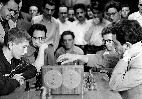 Bobby Fischer, then a 15-year-old prodigy, plays a practice game against Russian grand master Tigran Petrosian at Moscow's Central Chess Club in 1958.