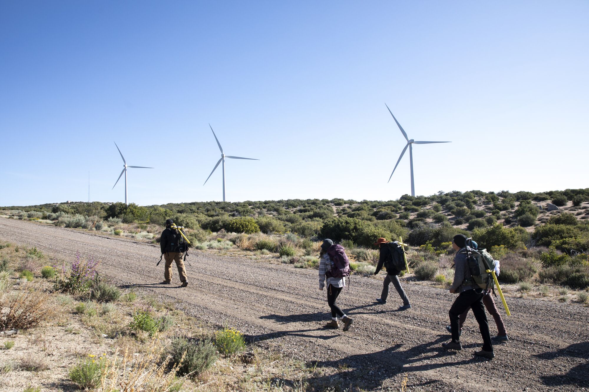 James Cordero with Border Kindness leads a group to deliver water and other supplies near Mount Laguna.