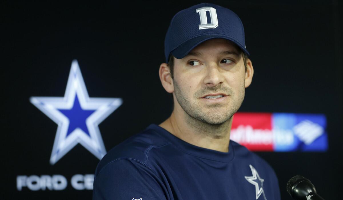 Dallas Cowboys quarterback Tony Romo speaks to the media Tuesday. Romo says Dak Prescott has "earned the right" to take his job as starting quarterback of the team.