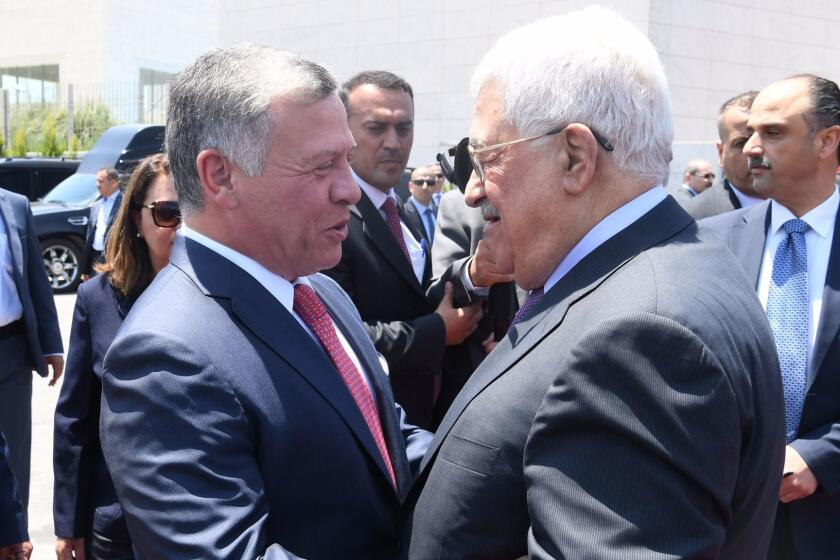 RAMALLAH, WEST BANK - AUGUST 7: In this handout image supplied by the office of the Palestinian president, King Abdullah II of Jordan is greeted by Palestinian President Mahmoud Abbas during his visit on August 7, 2017 in Ramallah, West Bank. (Photo by PPO via Getty Images) ** OUTS - ELSENT, FPG, CM - OUTS * NM, PH, VA if sourced by CT, LA or MoD **