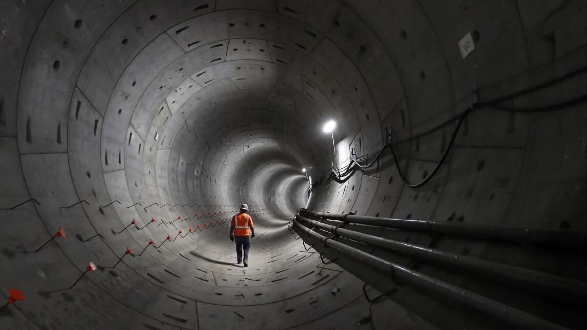 The Regional Connector, a 1.9-mile set of twin tunnels beneath downtown Los Angeles, will run from Little Tokyo to the financial district to link three rail lines, allowing for longer trips without changing trains.