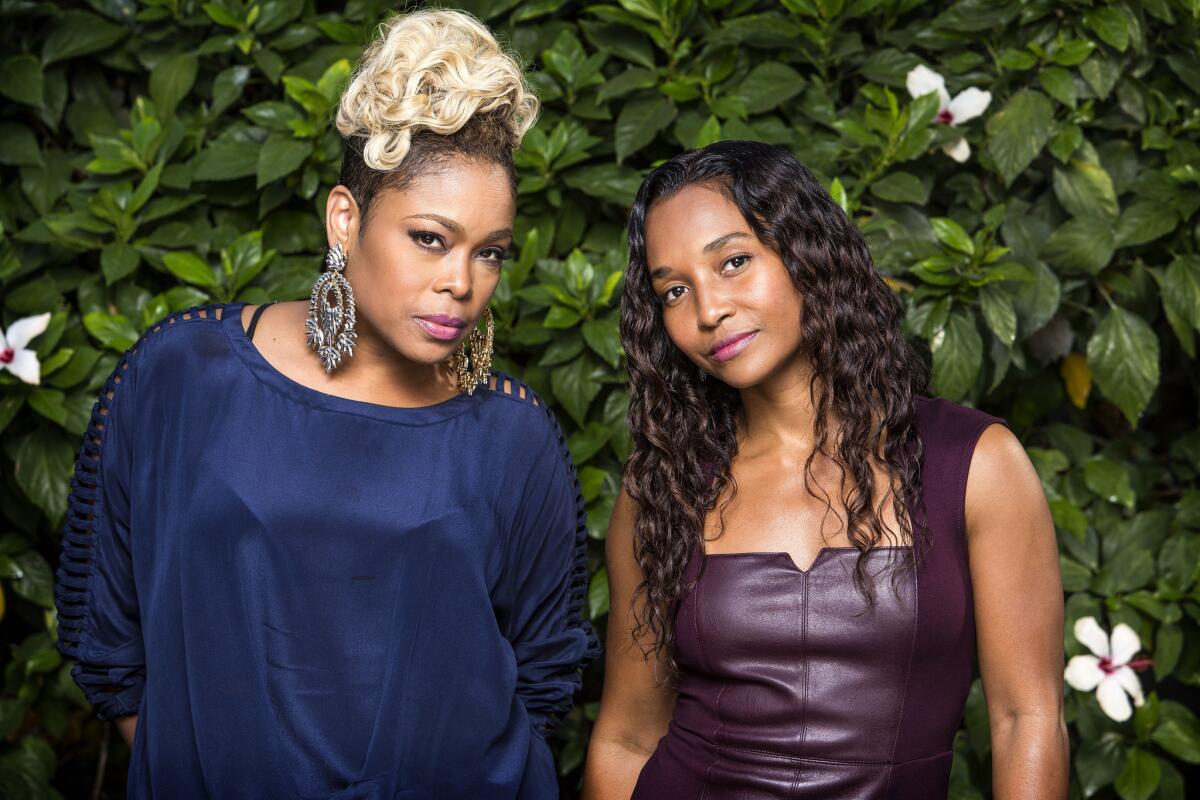 TLC members Tionne "T-Boz" Watkins and Rozonda "Chilli" Thomas, shown in 2013, raised funds on Kickstarter for their final album.