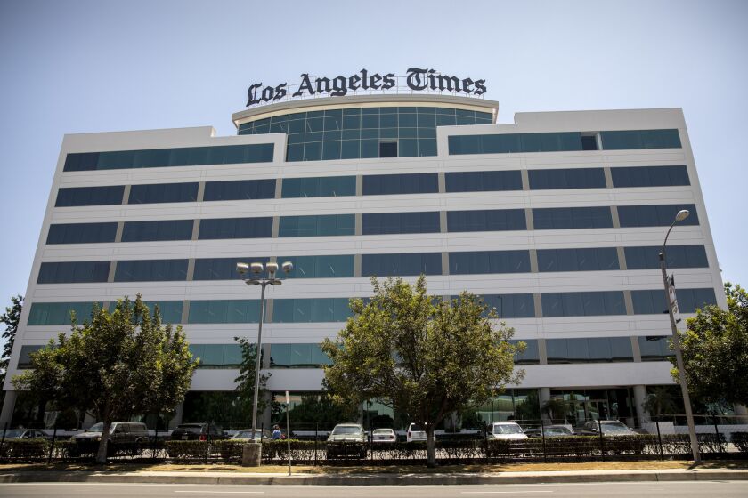 EL SEGUNDO,CA --THURSDAY, JUNE 28, 2018--The new sign on top of the new Los Angeles Times headquarters in El Segundo, CA., June 28, 2018. The paper, recently bought by, Soon-Shiong, is leaving its downtown L.A. headquarters for the El Segundo building, owned by Soon-Shiong, after previous owner, Chicago-based Tribune Media Co., sold the downtown property to Canadian developer Onni Group in 2016. (Jay L. Clendenin / Los Angeles Times)