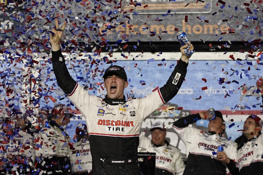 Austin Cindric celebrates in victory lane after winning the Daytona 500 on Sunday.