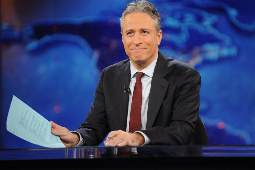 Jon Stewart hosts "The Daily Show with Jon Stewart" in New York on Nov. 30, 2011.
