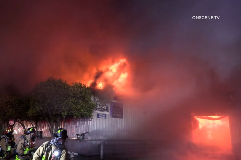 A fire erupted at a National City warehouse late Monday, officials said.
