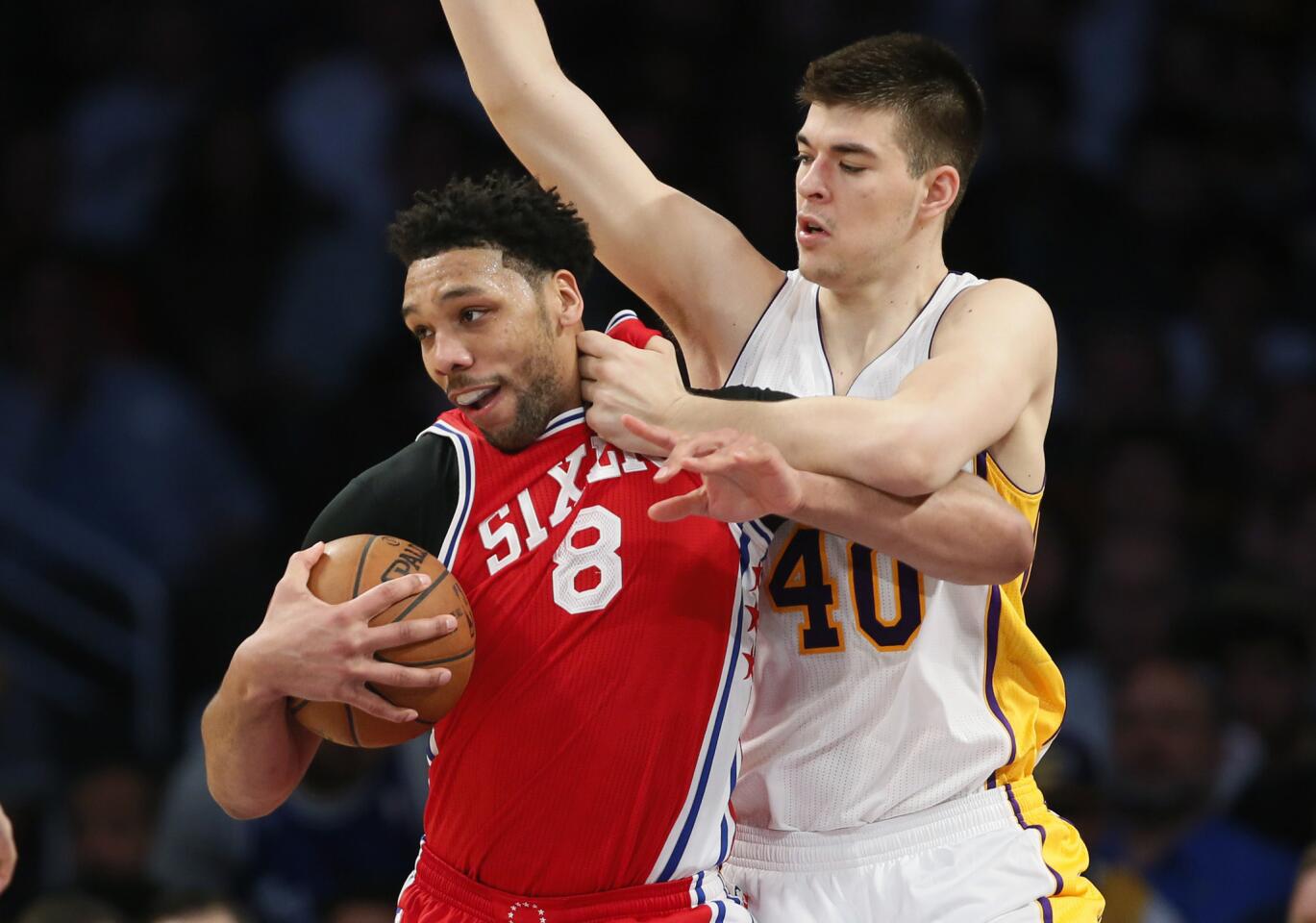 76ers center Jahlil Okafor (8) controls the ball while working in the post against Lakers center Ivica Zubac during the first half.