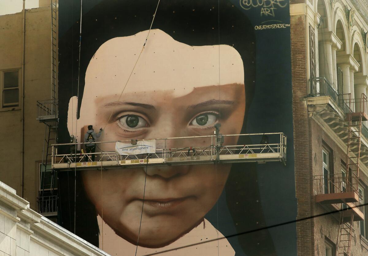 A mural was being painted on the side of a building depicting Swedish teen climate activist Greta Thunberg on Friday in San Francisco.