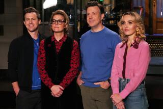 Alex Moffat, left, singer-songwriter Brandi Carlile, Jason Sudeikis and Chloe Fineman in "Saturday Night Live" on NBC.