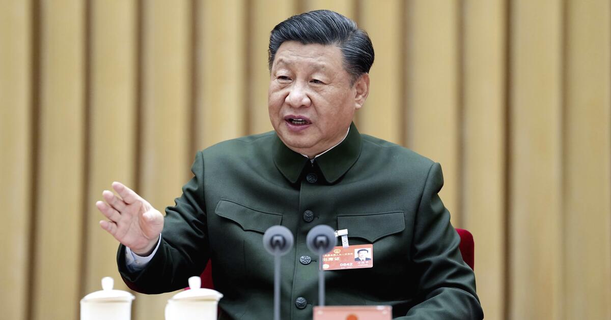 China's Xi calls for 'more quickly elevating' armed forces - Los Angeles  Times