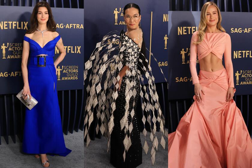 Los Angeles, CA - February 24: Anne Hathaway, Ali Wong and Brie Larson arriving on the red carpet at the 30th Screen Actors Guild Awards in Shrine Auditorium and Expo Hall in Los Angeles, CA, Saturday, Feb. 24, 2024. (Brian van der Brug / Los Angeles Times)