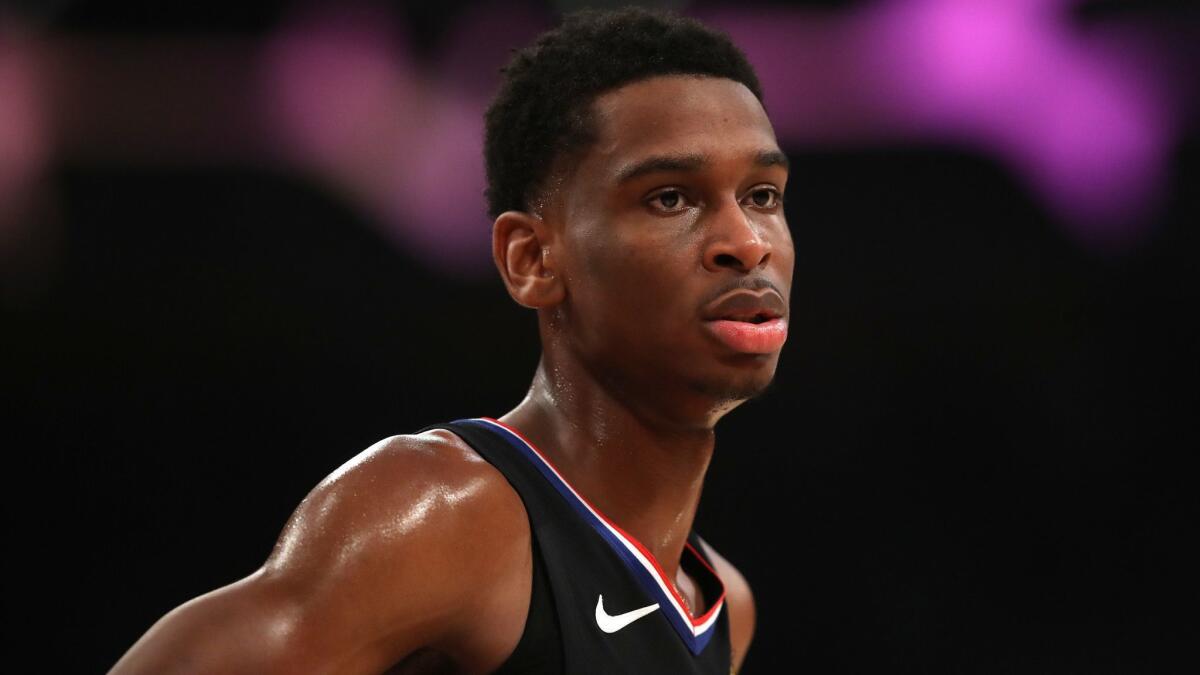 Clippers' Shai Gilgeous-Alexander looks on during the first half against the Lakers at Staples Center on Monday.