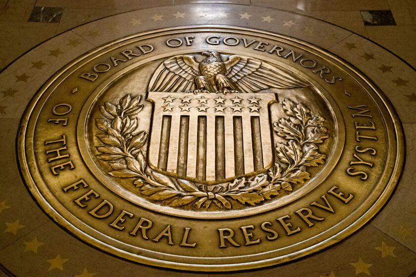 FILE- In this Feb. 5, 2018, file photo, the seal of the Board of Governors of the United States Federal Reserve System is displayed in the ground at the Marriner S. Eccles Federal Reserve Board Building in Washington. Susan Collins, the new president of the Federal Reserve Bank of Boston, said Monday, Sept. 26, 2022, that a higher unemployment will be needed to bring down inflation from unusually high levels, but suggested any economic downturn would be modest. (AP Photo/Andrew Harnik, File)