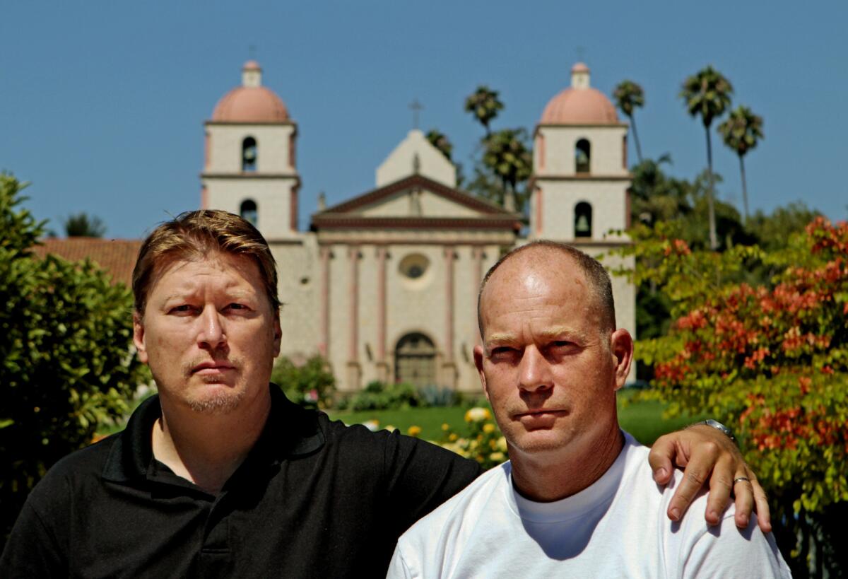 Damian Eckert, left, and brother Bob, shown at Old Mission Santa Barbara, say they were among boys molested by a priest at St. Anthony's Seminary.