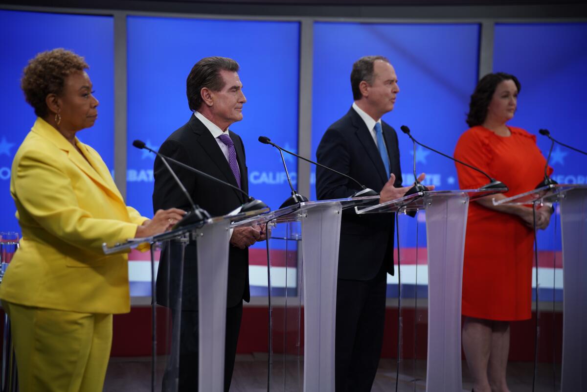 From left: Rep. Barbara Lee, Steve Garvey, Rep. Adam Schiff and Rep. Katie Porter on debate stage