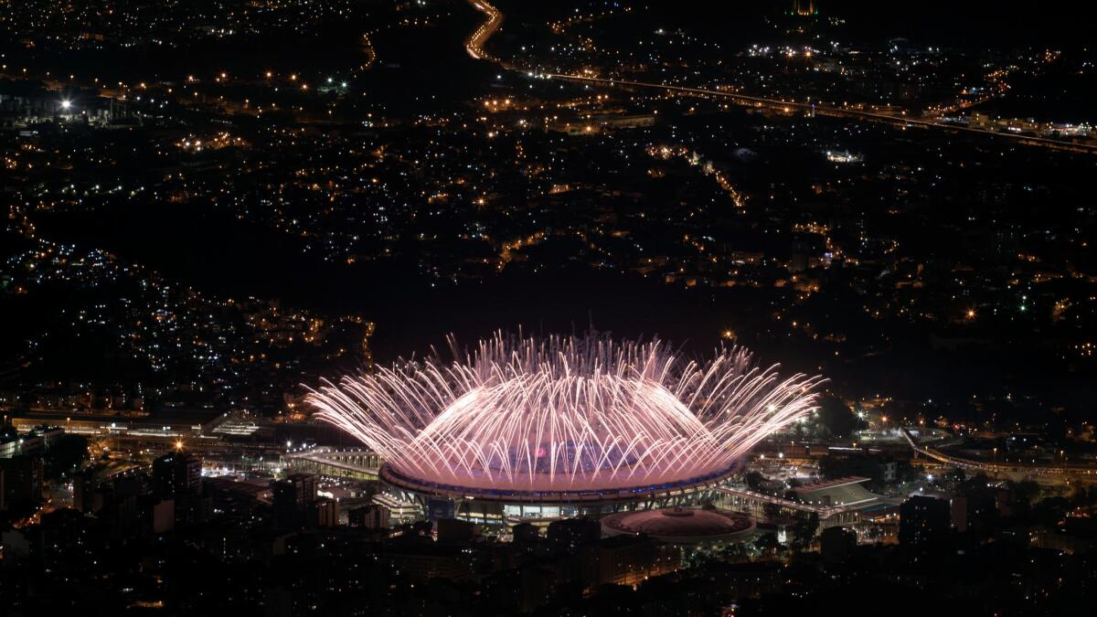 Fireworks explode over Maracaña Stadium during the opening ceremony at the 2016 Summer Olympics in Rio de Janeiro.