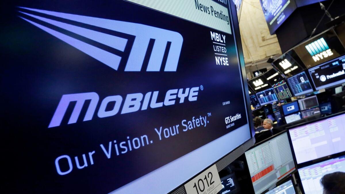 The logo for the Israeli company Mobileye appears on a screen at the New York Stock Exchange.