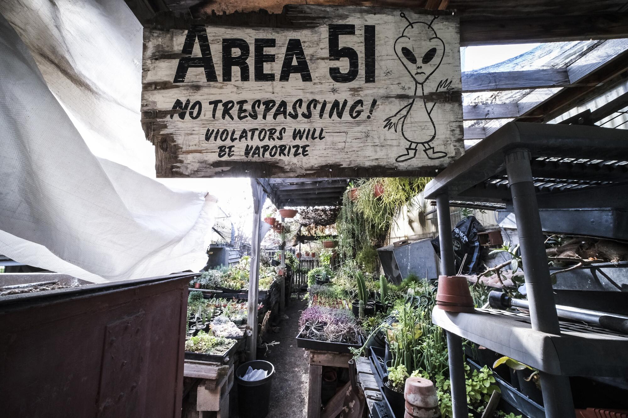 A humorous sign warns people against trespassing in "Area 51" of the Cactus Ranch.