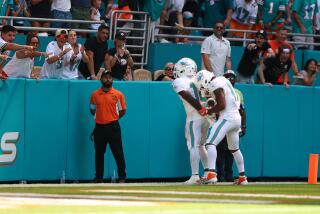 MIAMI GARDENS, FLORIDA - SEPTEMBER 08: Tyreek Hill #10 of the Miami Dolphins and Jaylen Waddle #17 of the Miami Dolphins celebrate after Hill's receiving touchdown during the third quarter against the Jacksonville Jaguars at Hard Rock Stadium on September 08, 2024 in Miami Gardens, Florida. (Photo by Megan Briggs/Getty Images)