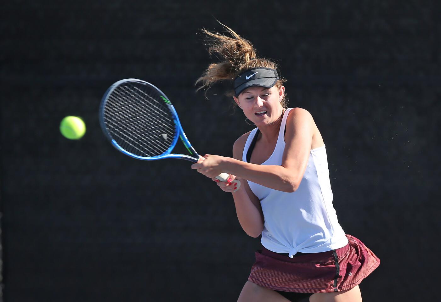 Laguna Beach High's Ella Pachl runs down a baseline shot in singles action of a Wave League tennis match on Tuesday.