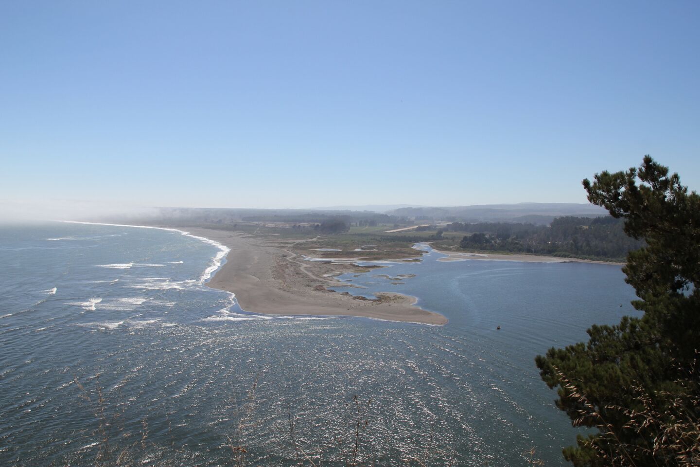 Constitución sits at the mouth of the Maule River and is subject to earthquakes and seasonal flooding, in addition to the occasional tsunami. This is the view north, from Mutrún Hill. The Pacific Ocean is to the left.