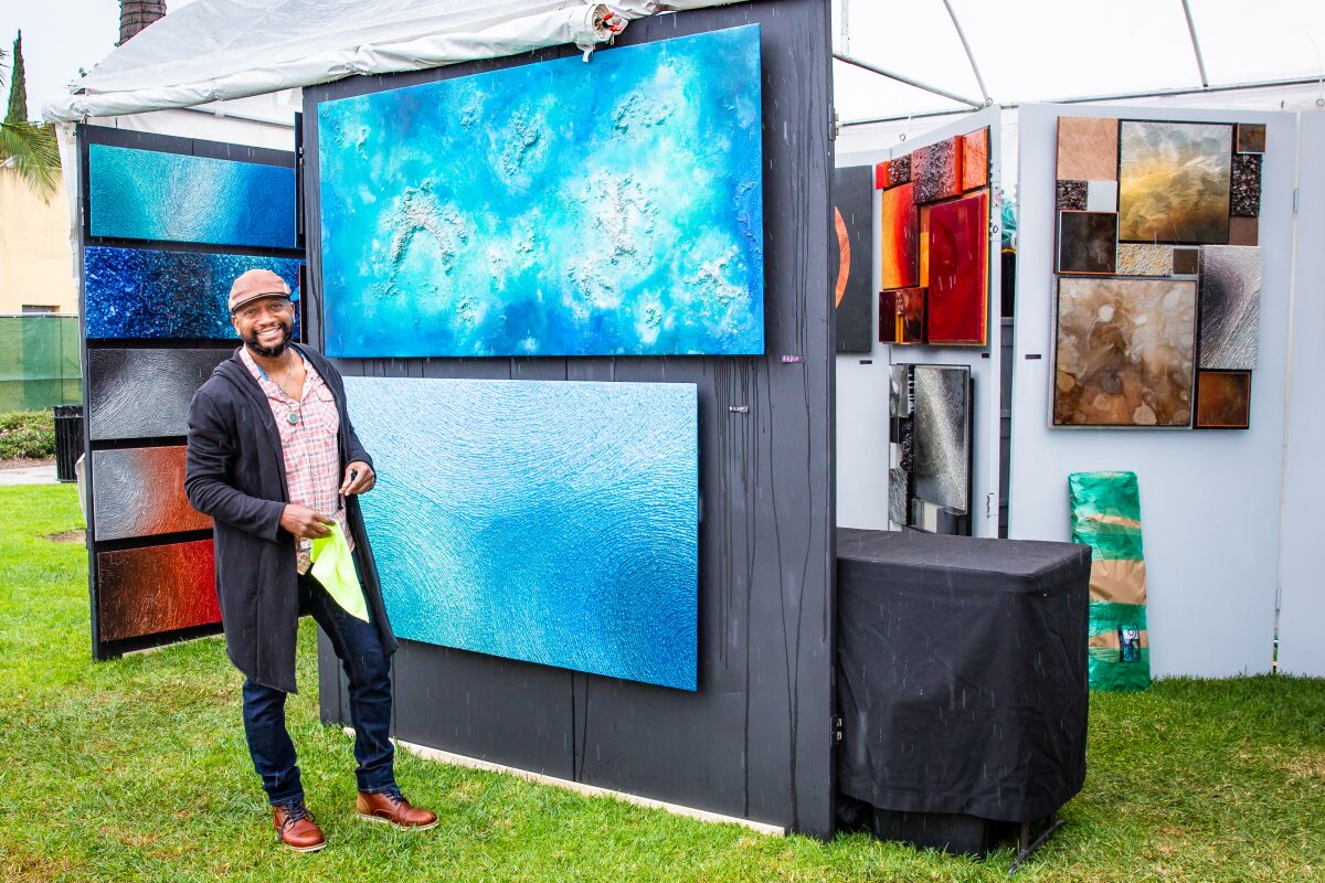 Artist Neil Russell displays his work at the 2020 ArtWalk @ Liberty Station, held in November.
