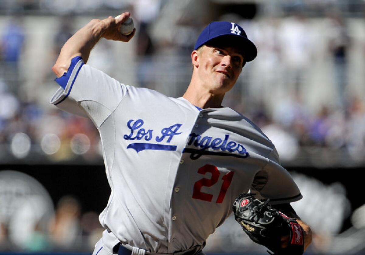 Dodgers starter Zack Greinke pitches during the first inning against the San Diego Padres at Petco Park on Saturday.