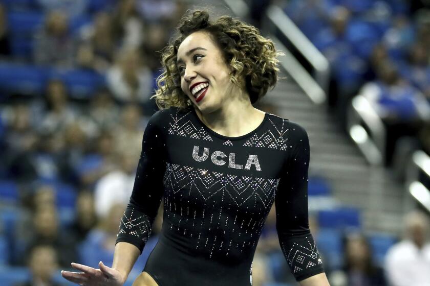Katelyn Ohashi of UCLA during an NCAA college gymnastics match, Friday, Jan. 4, 2019, in Los Angeles. (AP Photo/Ben Liebenberg)
