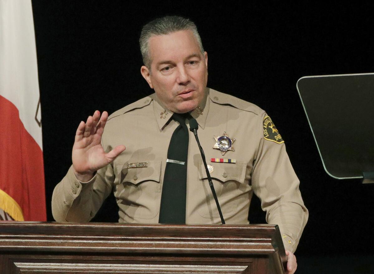 Los Angeles County Sheriff Alex Villanueva speaks during a ceremony in Monterey Park in 2018. 