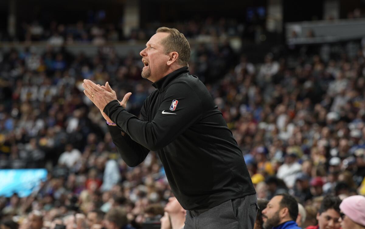 Raptors coach Nick Nurse yells instructions from the sidline.