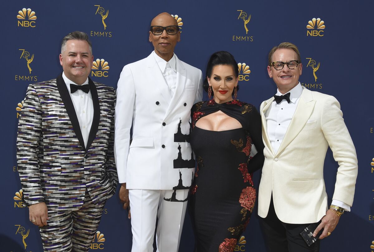 Ross Mathews, from left, RuPaul Charles, Michelle Visage and Carson Kressley arrive at the Emmy Awards.