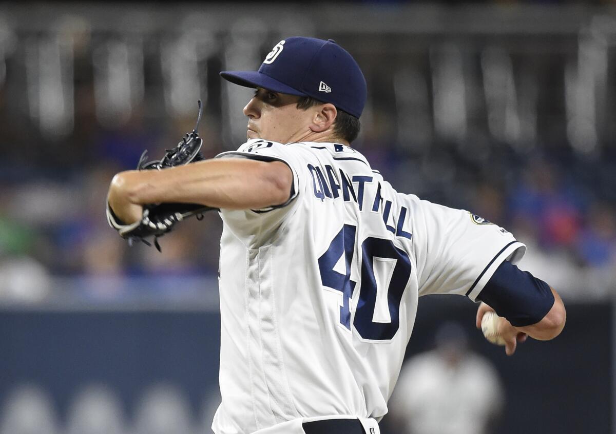 Robert Suarez of the San Diego Padres pitches in the eighth inning News  Photo - Getty Images