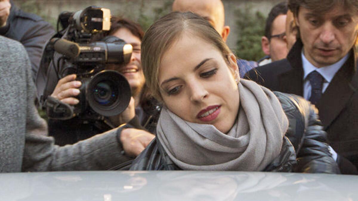 Carolina Kostner leaves at the end of a Jan. 16 hearing in her case at Rome's Olympic Stadium.