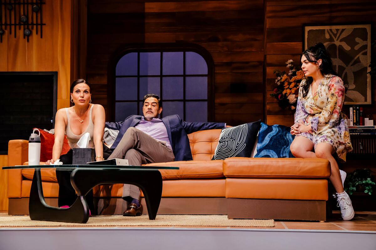 Lana Parrilla, from left, Carlos Gomez and Isabella Gomez in "One of the Good Ones" at Pasadena Playhouse.